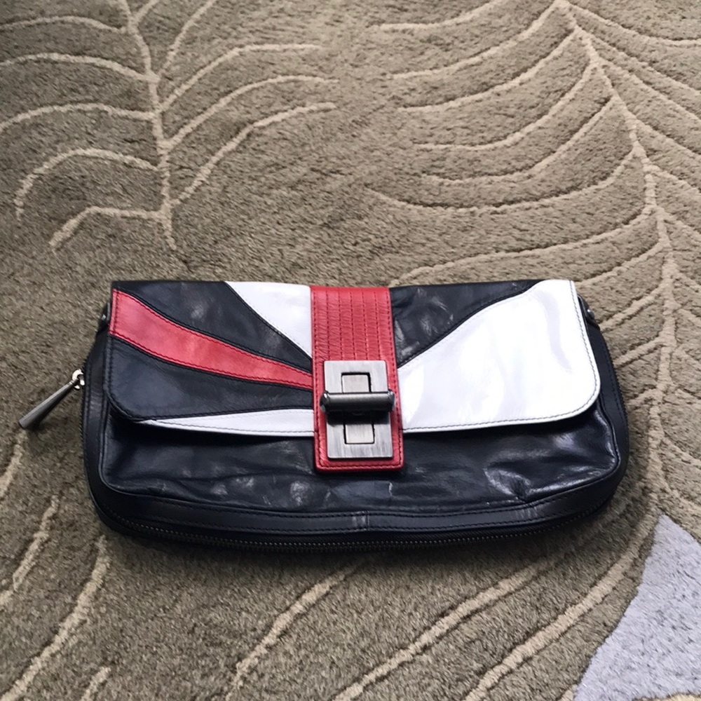 Modern clutch fits so much! Genuine leather